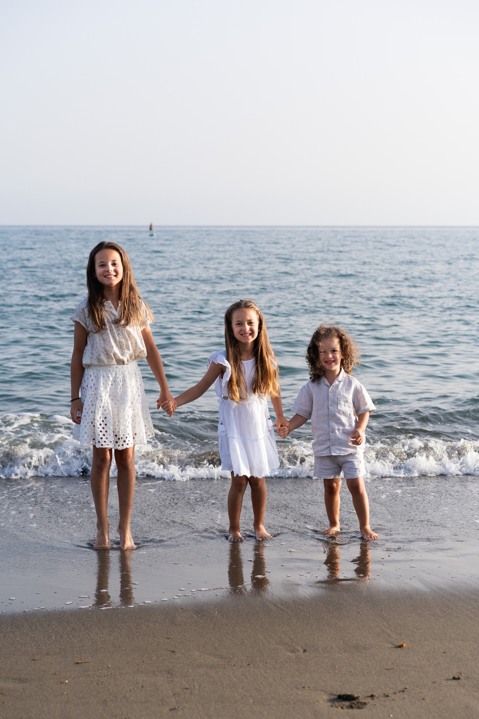 Family beach session at golden hour