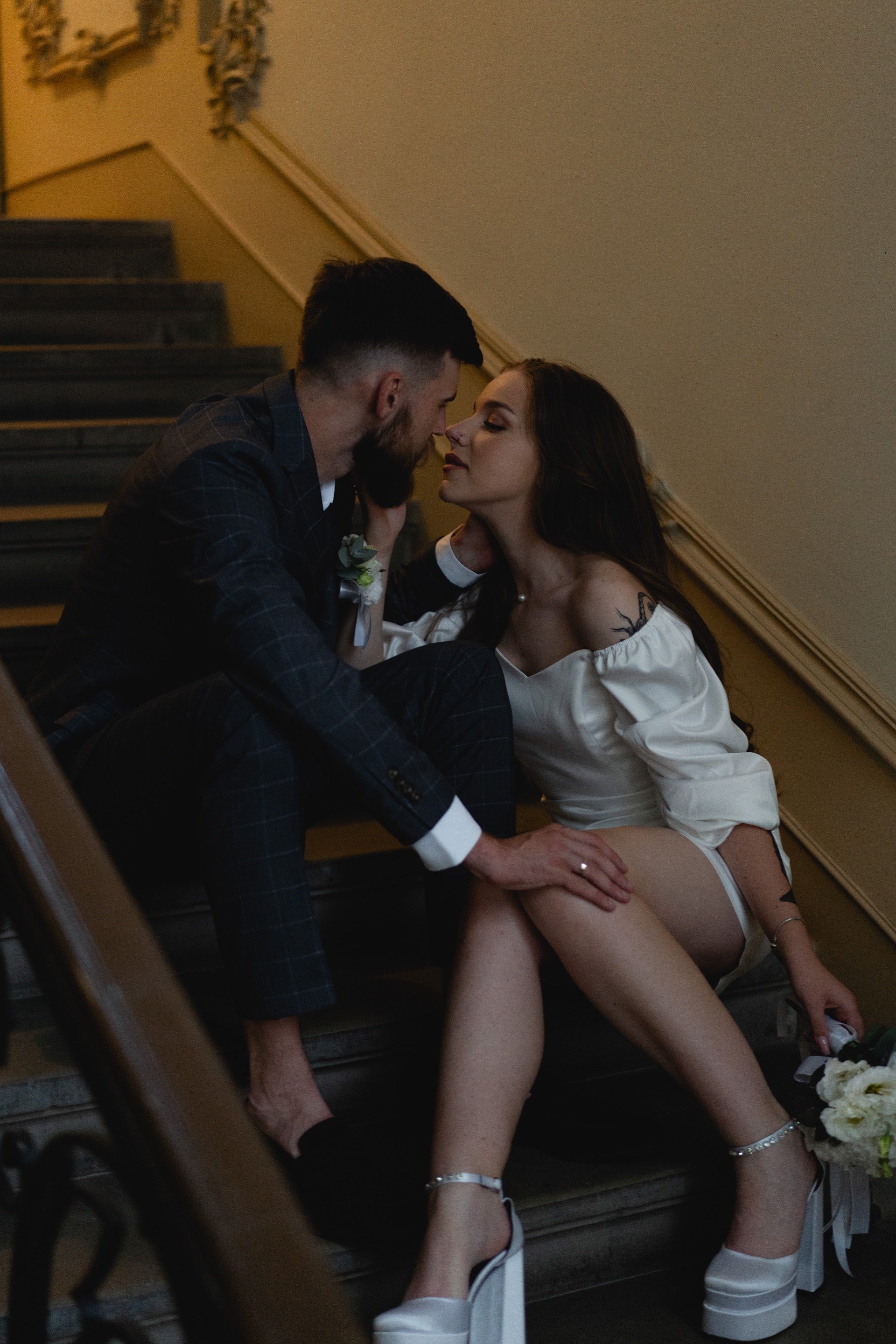 Bride and groom sharing their first kiss at Marbella beach wedding